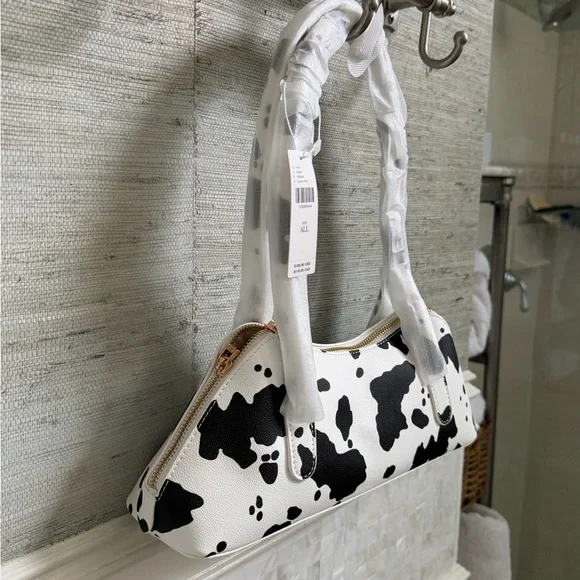 NWT new Anthropologie melie bianco east west shoulder bag cow print black white - Picture 10 of 15